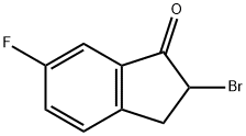 2-BROMO-2,3-DIHYDRO-6-FLUORO-1H-INDEN-1-ONE